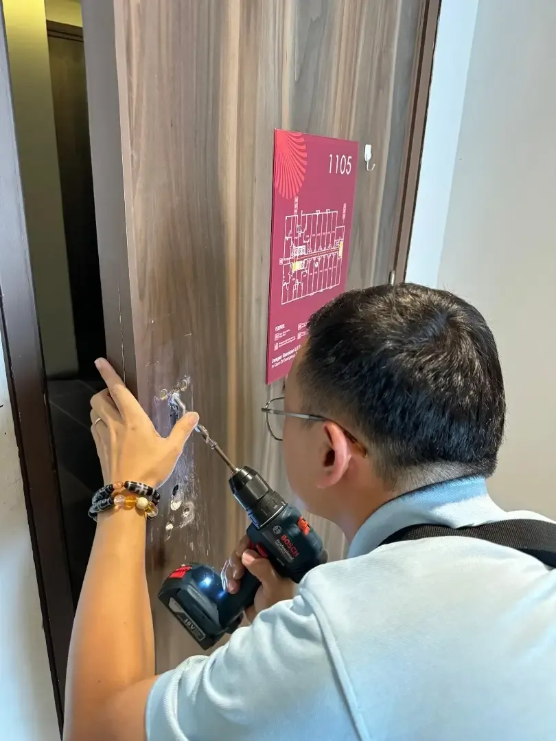 A smart door lock installed on a main entrance door.