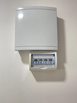 A smart meter installed in a residential distribution board.