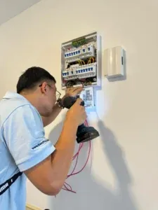 A close view of a smart meter showing its display and terminals.