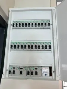 A bank of smart meters serving several units.