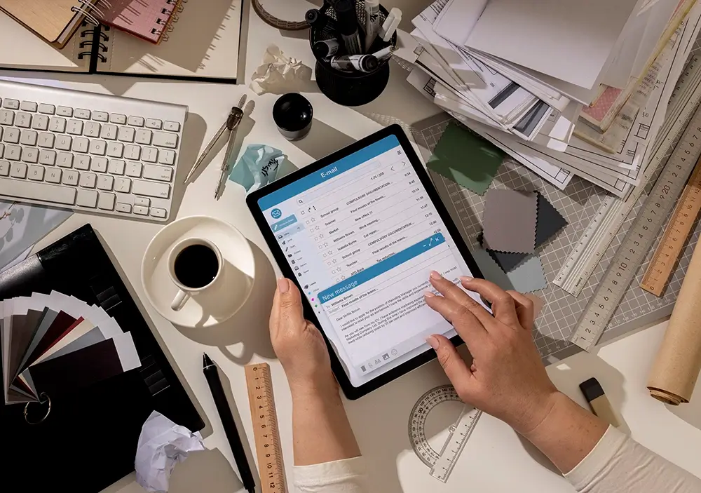 top-view-messy-office-workspace-with-tablet copy